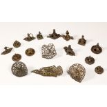 India, a collection of seventeen metal stamps in various forms among which one of the Bouddha's feet
