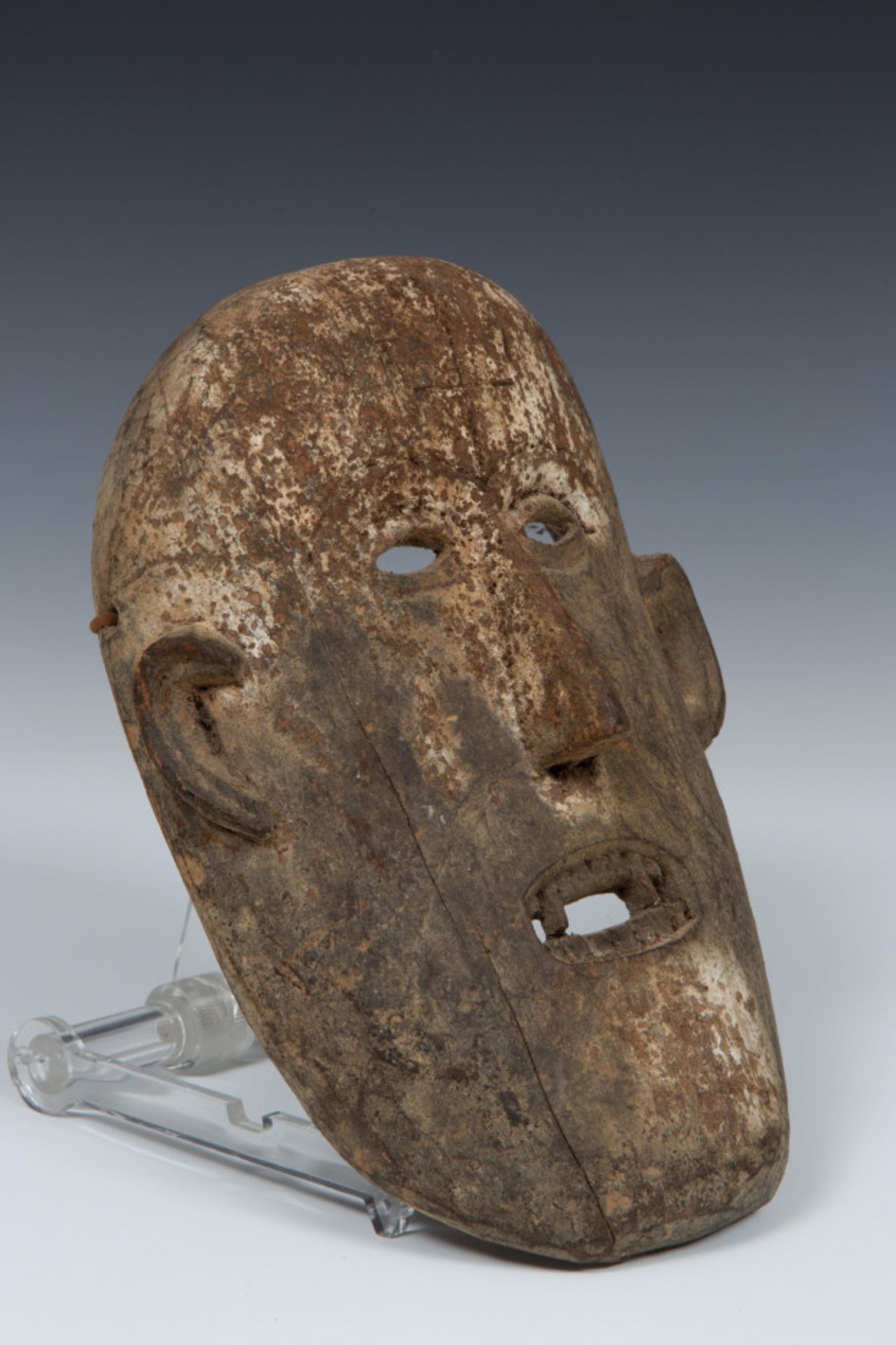 Nepal, demonic shaman mask with lacquer seal, fang teeth and remains of offering pigments,