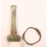 Roman, glass perfume bottle and bronze child bracelet, ca. 2nd century BC.