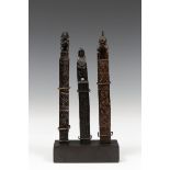 Moluccas, Tanimbar, three wooden amulets,