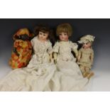 Collectie poppen, deels met porseleinen koppen, 19e / 20e eeuw,