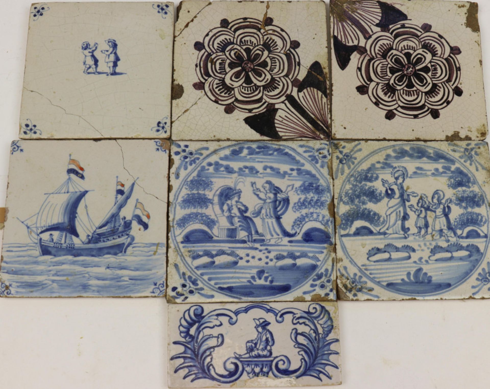 Delft, zeven blauw-wit en mangaan aardewerk tegels, 17e-18e eeuw,