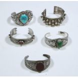 India, collection of five silver bracelets two with cornealines, two with turquoise one with silver