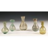 Roman, collection of five glass bottles, 2nd-3rd century.
