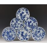 China, serie van acht blauw-wit porseleinen borden, Kangxi,