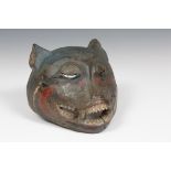 Central North Java, an expressively carved and painted wooden tiger mask,