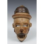 Nigeria, Ogoni, a fine carved wooden mask with movable jaw,