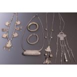 Collection of oriental jewelry, silver or silver alloy three necklaces, two bracelets and one conta