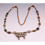 Sumba, beaded necklace with an amulet of a horse.