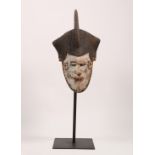 Nigeria, Ibo, maiden mask, on a stand