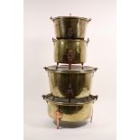Serie van vier geel koperen kook potten, 19e eeuw,