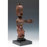 Sumatra, Toba Batak, a wooden standing defensive figure, pangulubalang, late 19th - early 20th centu