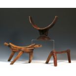 Sudan, Dinka, two wooden neckrests and Kenia, a large wooden neckrest.