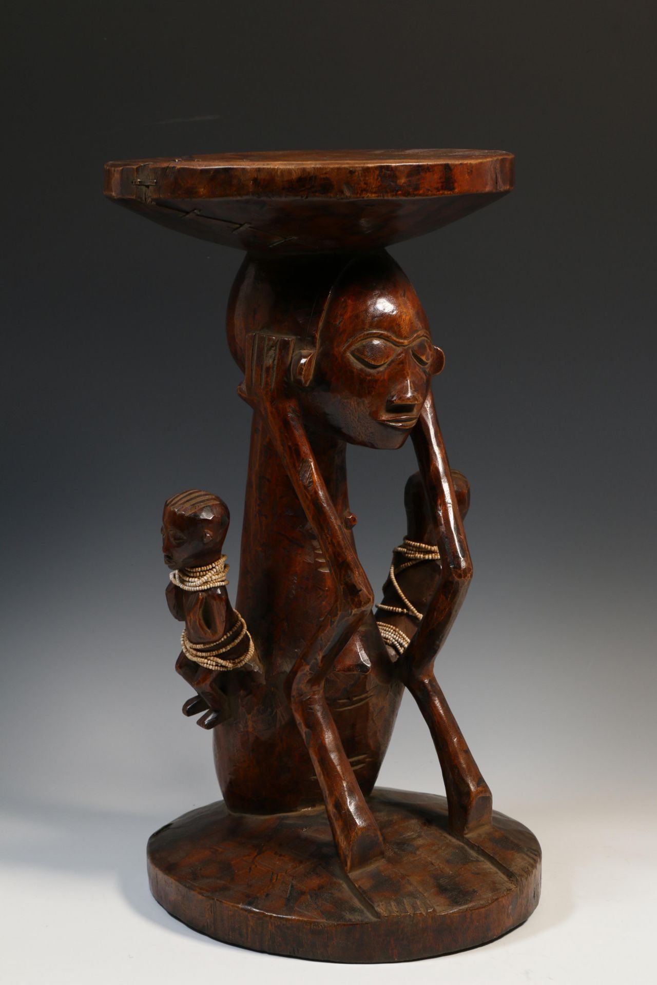 DRC, wooden caryatid stool, local repairs