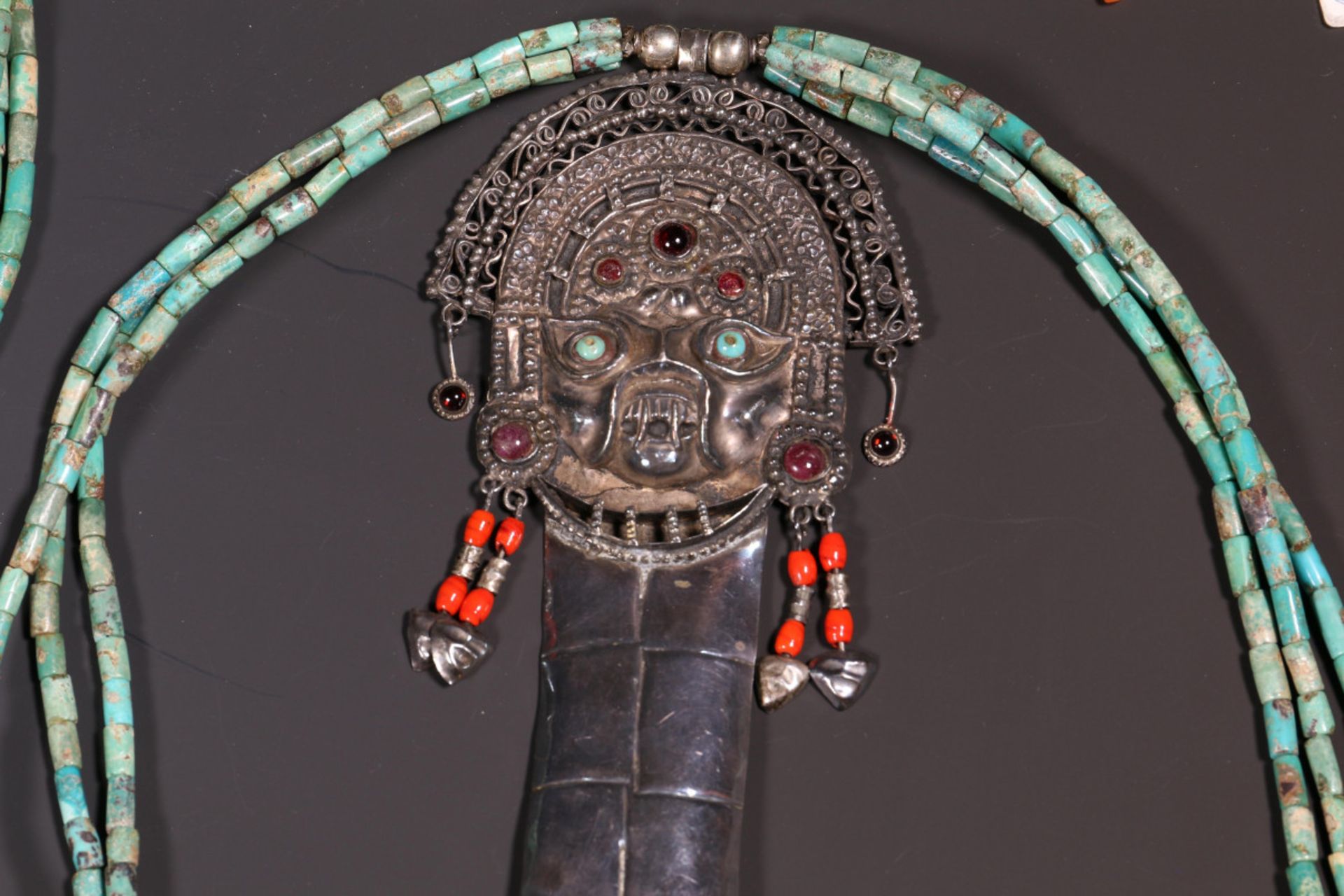 Egypt, two beaded necklaces with antique amulets and South America, two turquoise necklaces with pen