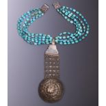 Syria, silver alloy necklace with turquoise beads and cap shaped pendant