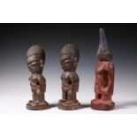 Nigeria, Yoruba, Ijebu, Iperu, two male twin figures and an Ijebu female twin figure