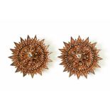 Sumatra, Minangkabau, pair of star shaped 9 kt golden ornaments,