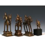 Tamil Nadu, collection of four brass statues of Khandoba and Mhalsa, three on the white horse