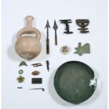 Collection of various antique objects one pre-Columbian vessel, a decorated bead, an eroded bowl, a