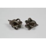 Java, Solo, a pair of silver ear ornaments,