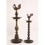 Sumatra-Aceh, two copper alloy oil lamps both crowned with a rooster