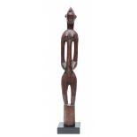 Ivory Coast, Senufo, wooden anthropomorphic figure-stamper, deble
