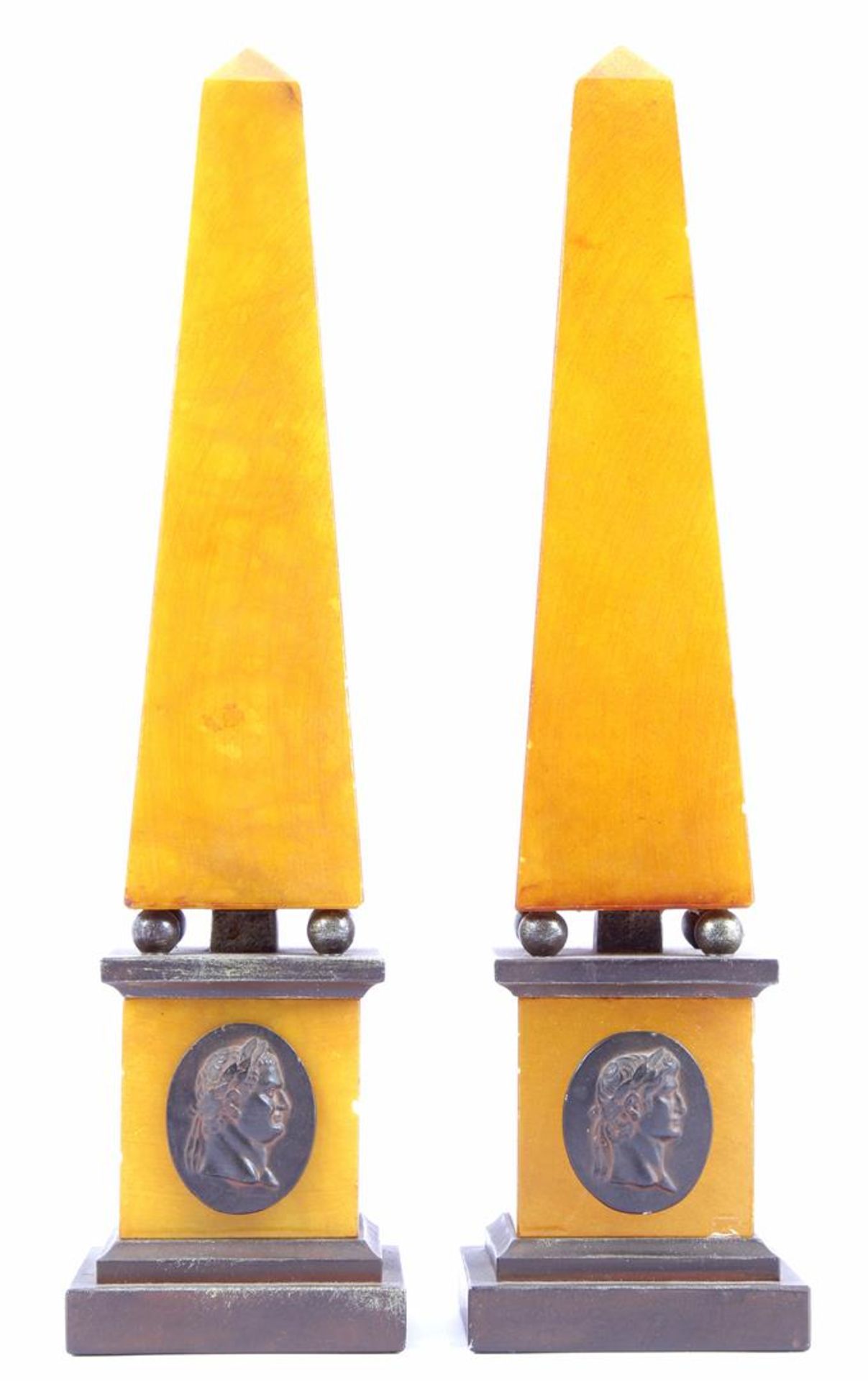 2 stone Grand Tour obelisks on a bronze colored base 39 cm high