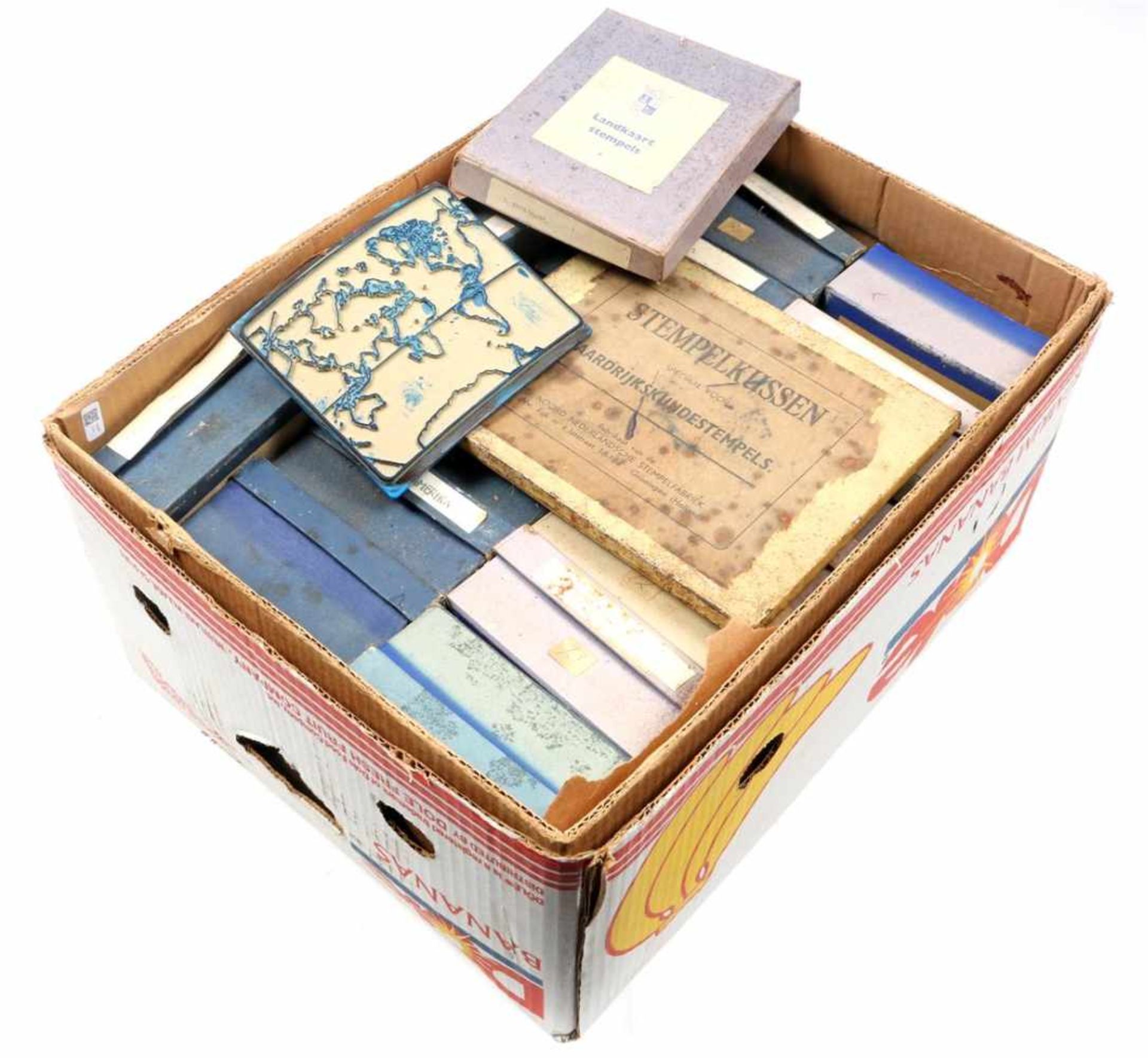 Box with collection of geography stamps