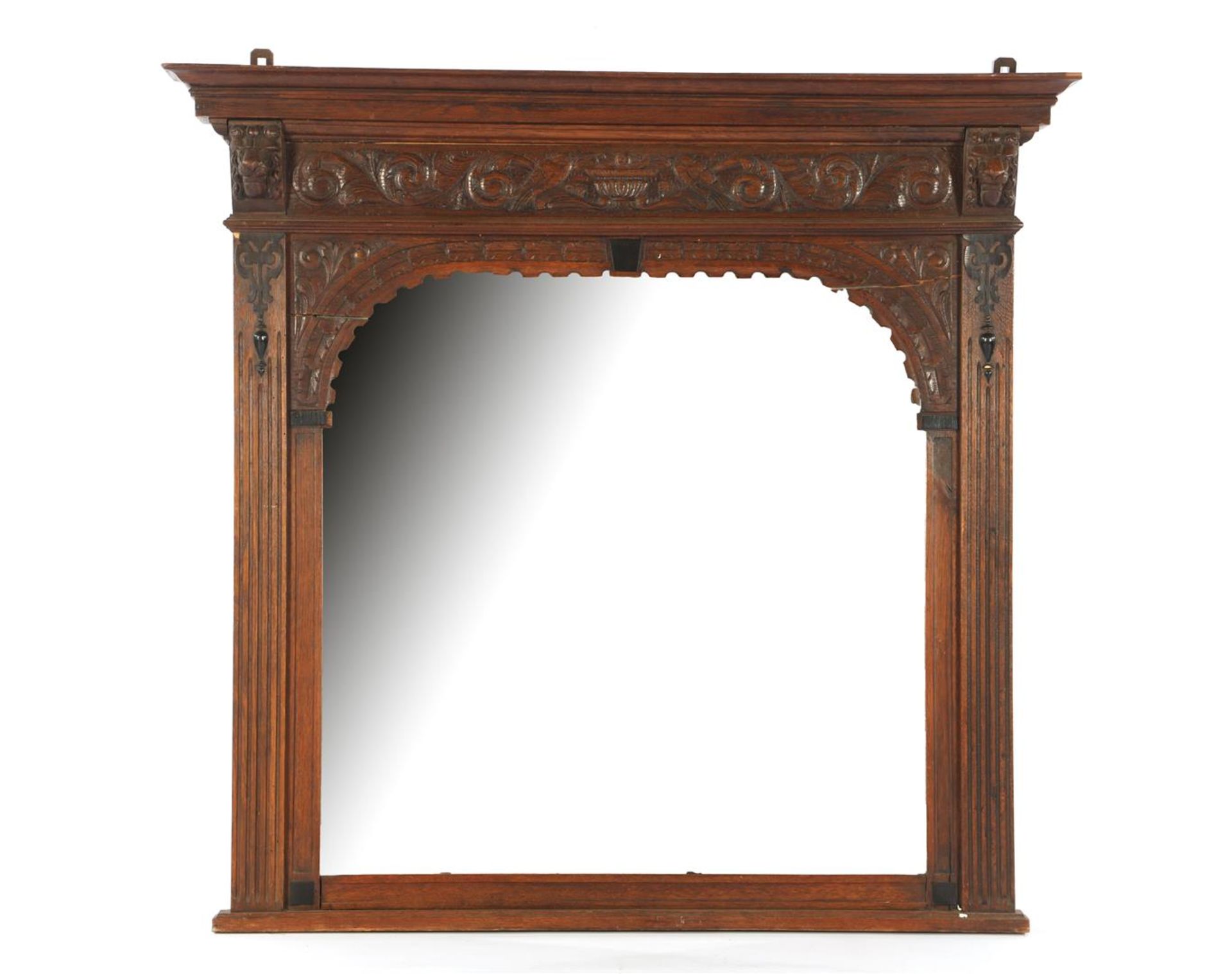 Mirror in an oak richly decorated frame with lion masks, 96x101 cm