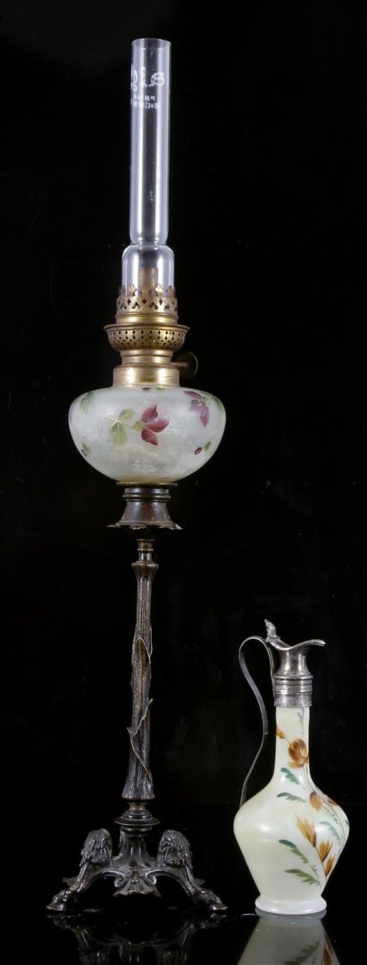 Table oil lamp with glass painted pot on bronze stand 55 cm high and painted glass carafe for oil,