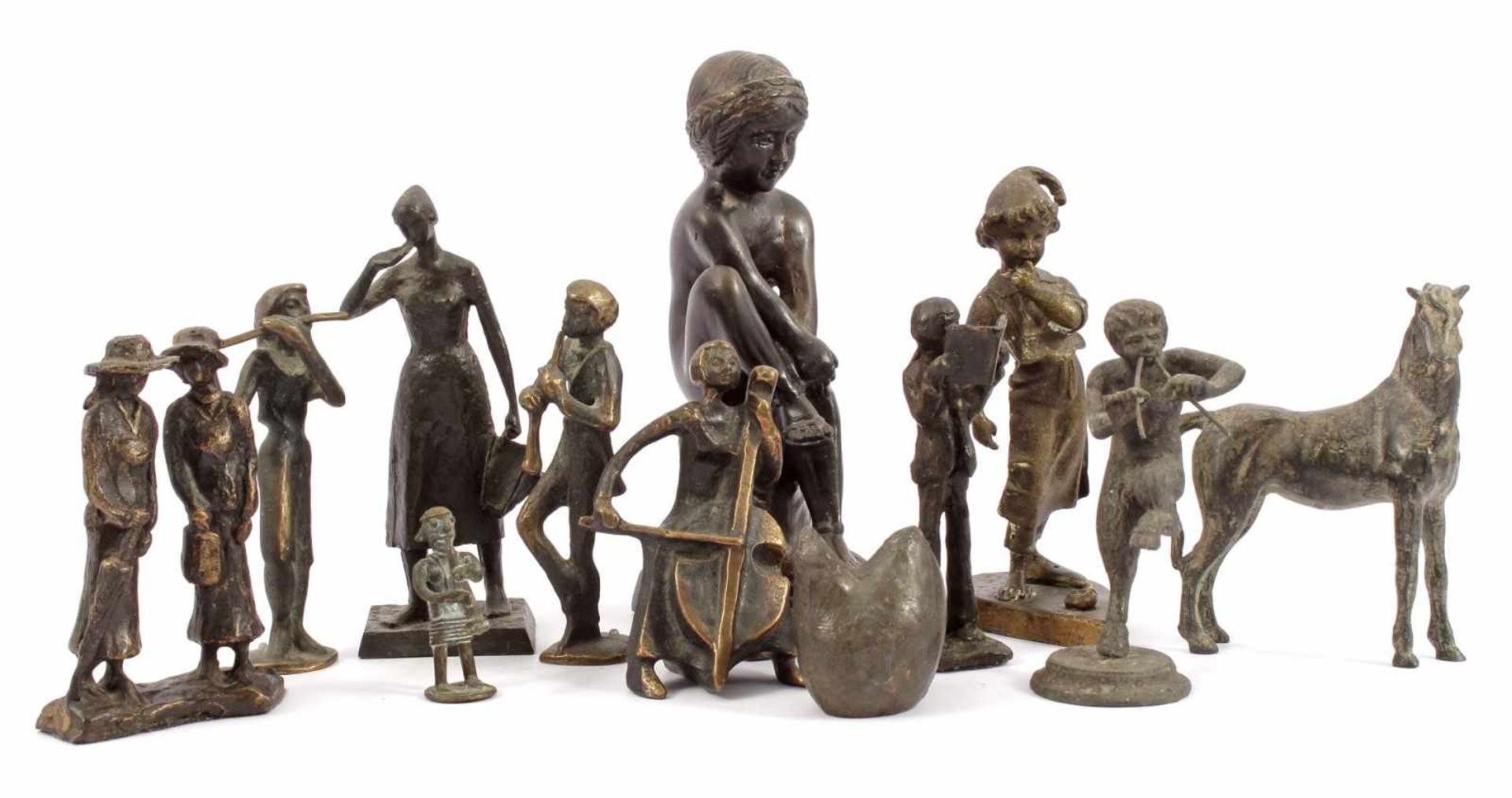 12 various bronze figurines 5.5 cm-18.5 cm high