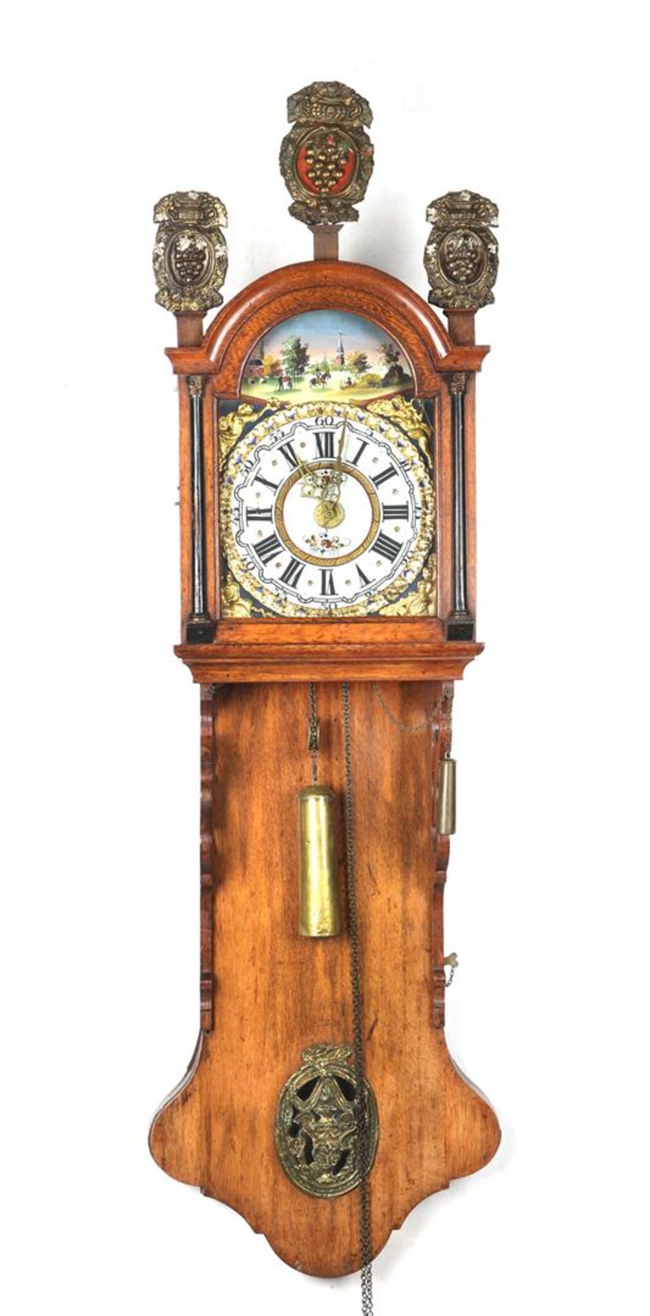 Antique Frisian tail clock in oak case with painted dial with bridal wreath and latons on the