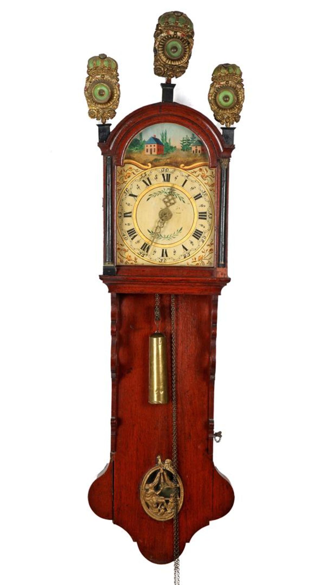 Frisian tail clock with painted dial and blackened half-full columns, with lattices, in an oak case,