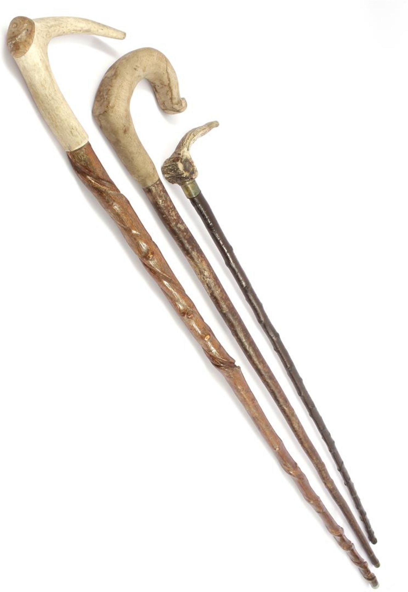 3 old walking sticks with handles made of antlers, 104, 121 and 130 cm long