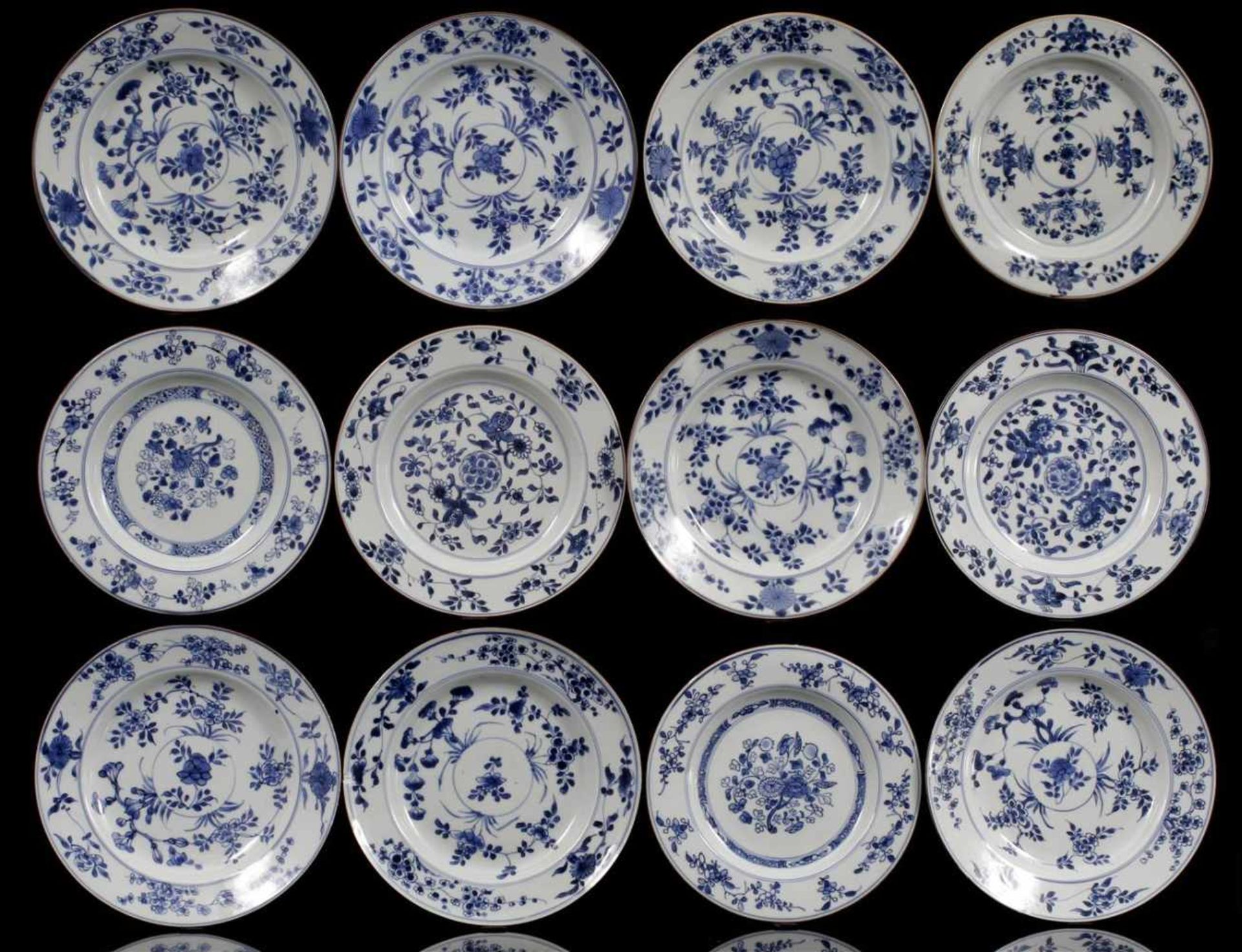 12 Chinese porcelain saucers with floral decor & nbsp; in various designs, late 18th century, 21.5-