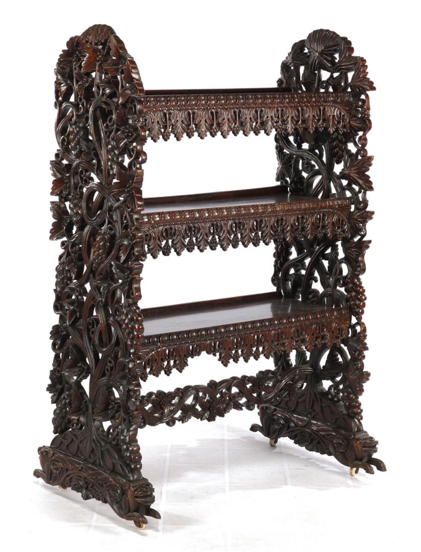 Eastern rosewood richly carved 3-shelf etagere with vines, leaves and 4 feline animals at the