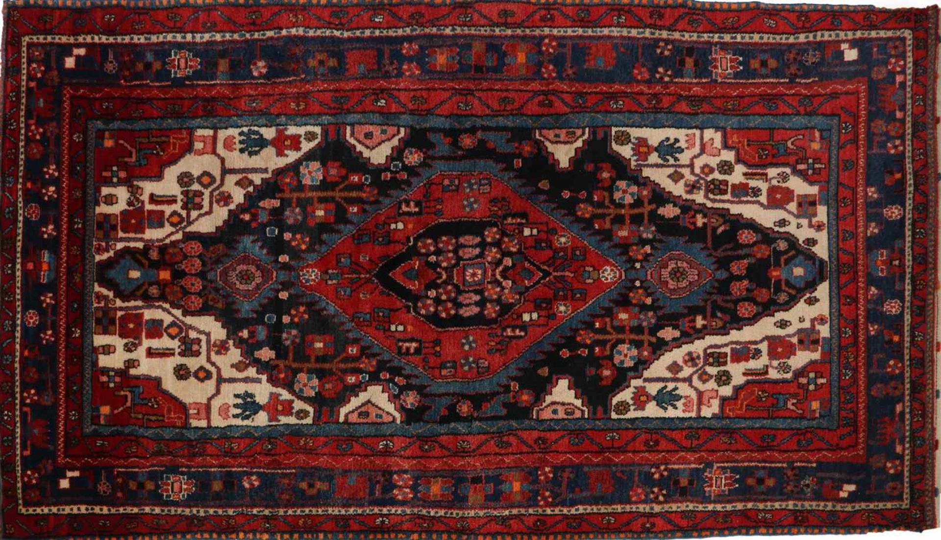 Oriental hand-knotted rug 290x157 cm