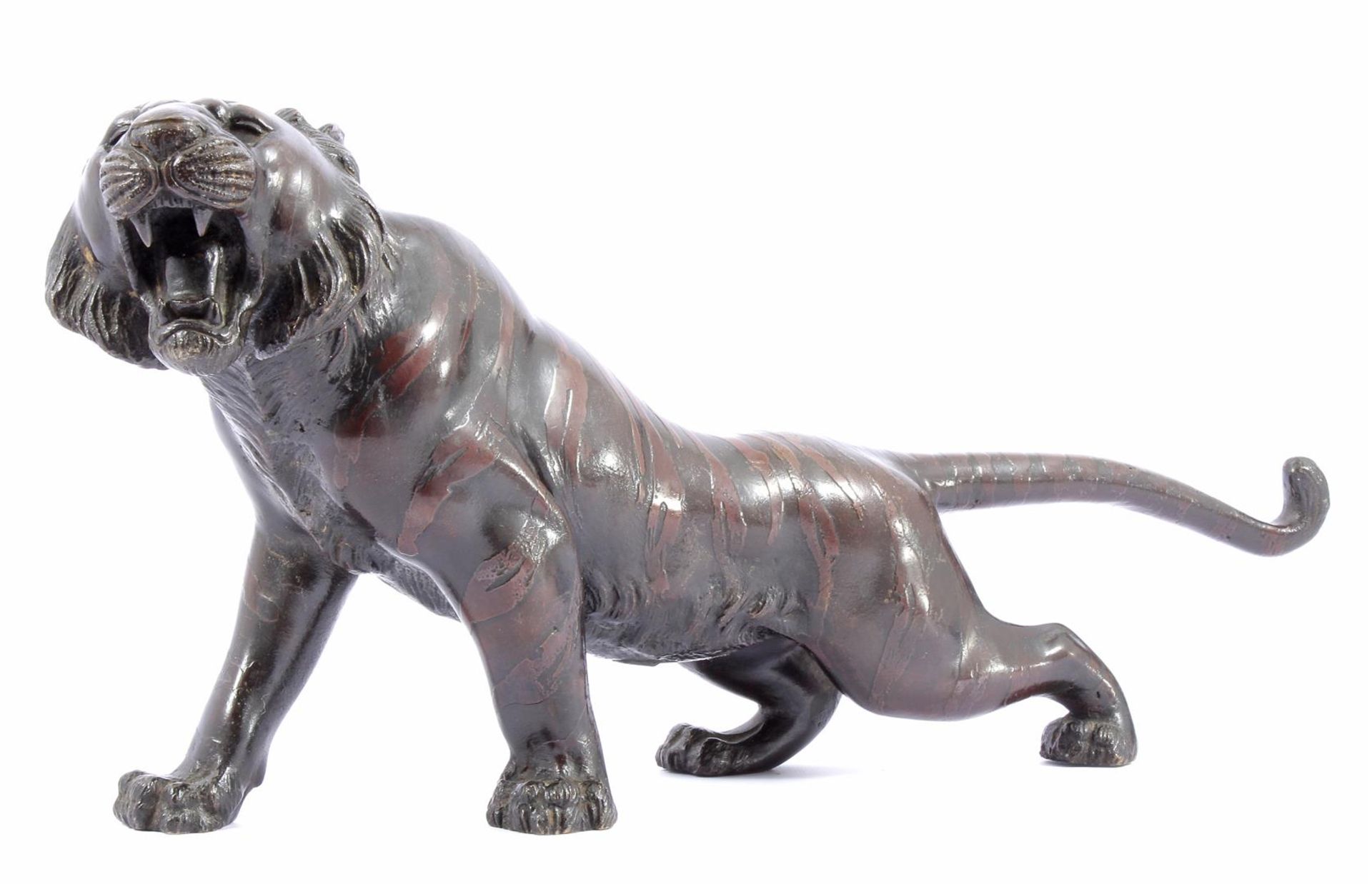 Bronze colored metal statue of a tiger 21 cm high, 47 cm long