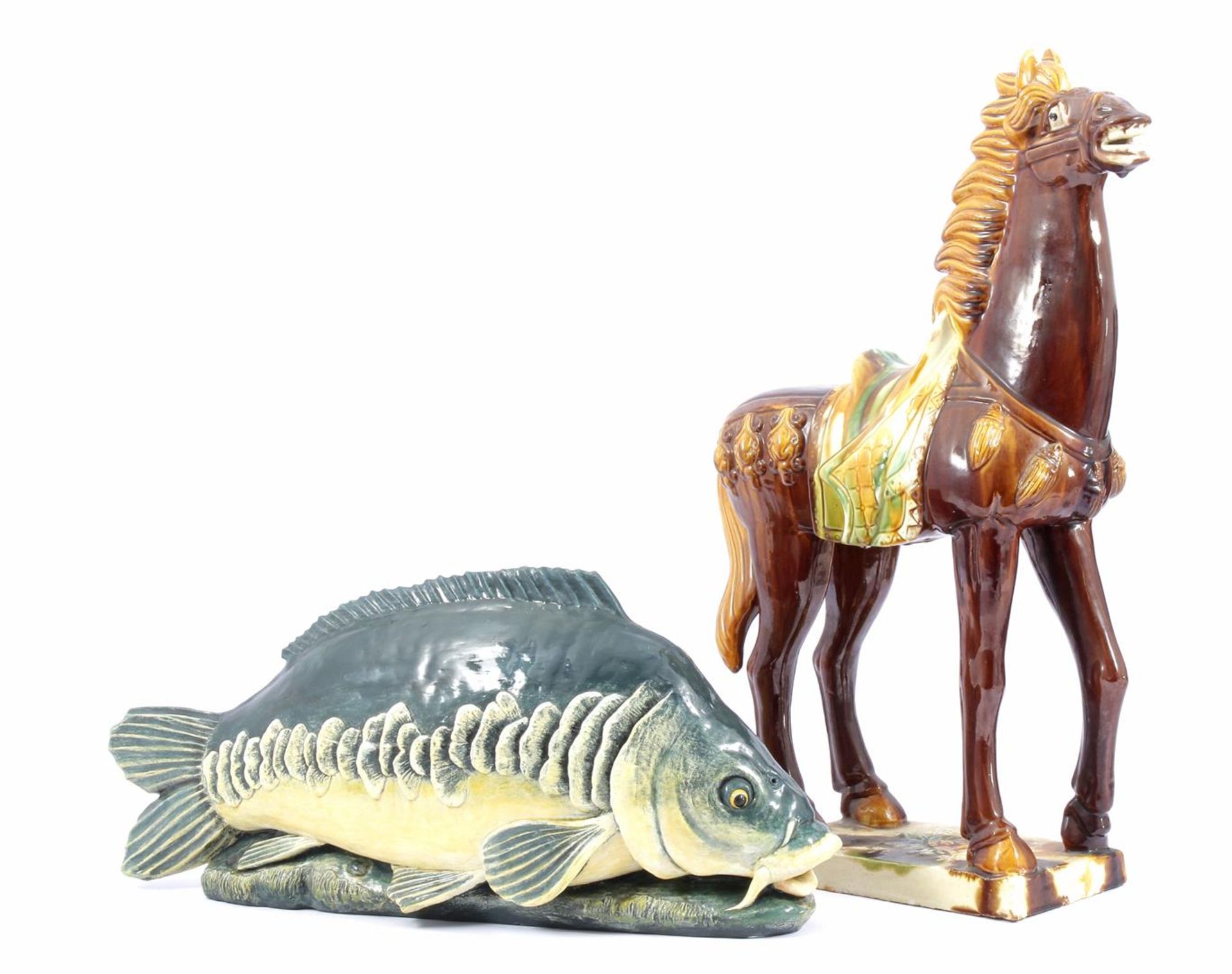 Plaster polychrome glazed statue of a horse 59 cm high, 38 cm long, and the same fish 24 cm high, 55