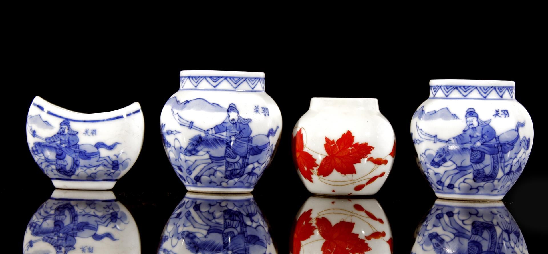 4 porcelain bird feeders with various decorations including figure on horse, China 20th century,