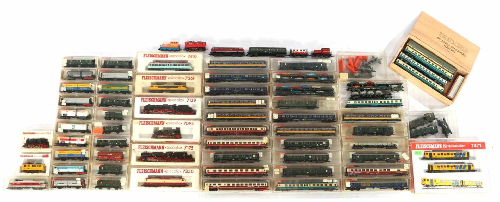 79 Fleischmann Gauge N trains, wagons and locomotives, most of them with box
