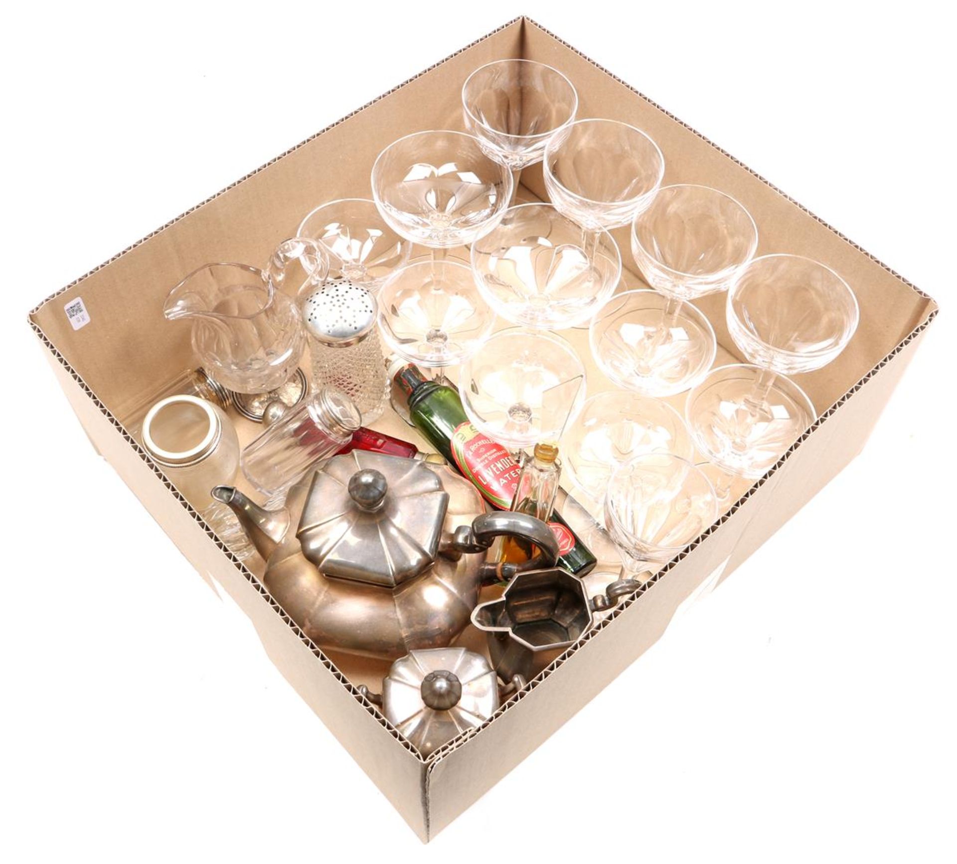 Box with crystal glasses, perfume bottles, crystal and glass with silver frame and silver plated tea