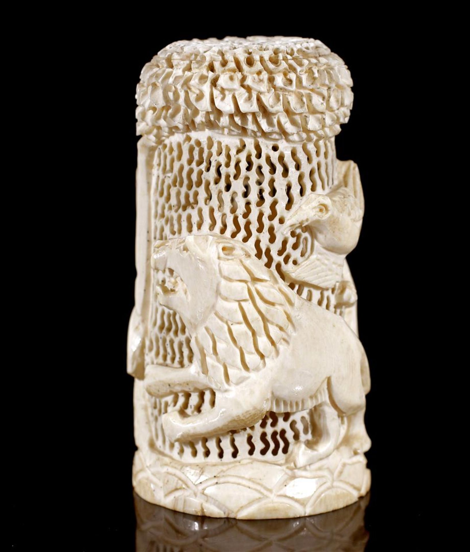 Richly carved ivory object with decoration of elephant and lion, Africa approx. 1890, 9 cm high,