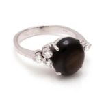 White gold fantasy ring, 18 kt, set with onyx and brilliant cut diamond, approx.0.60 ct, 20.25 mm