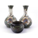 2 Arnhemsche Fayence pottery vases with Flora decor, 28 cm high (1 vase with hairline in the neck)