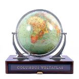 Table globe with Columbus Weltatlas E Debes Handatlas Dr. Karlheinz Wagner Jubilaumsausgabe Berlin