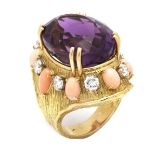 Impressive gold fantasy ring, 18 kt., Set with large oval amethyst, coral and brilliant cut diamond,