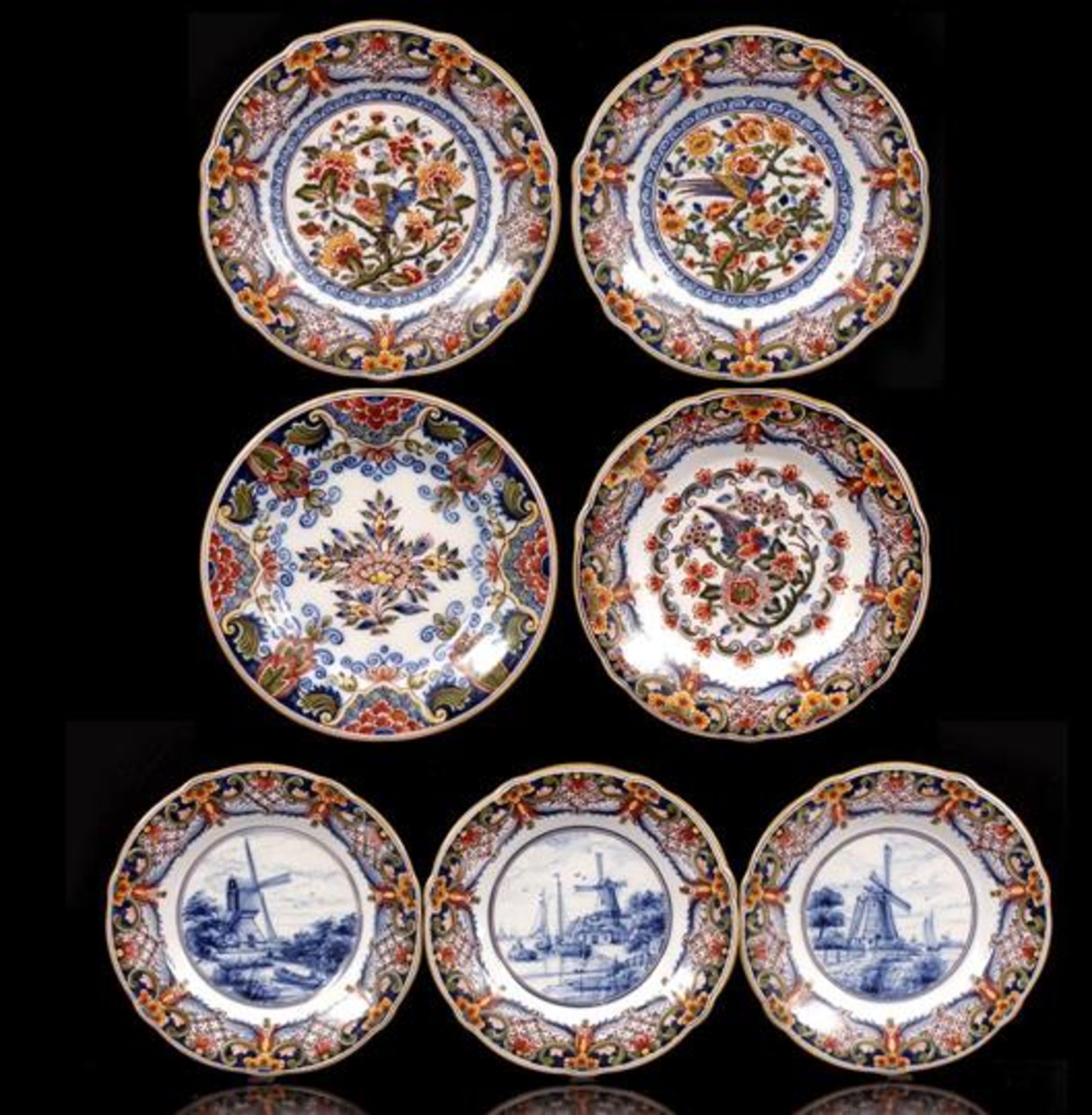 3 Tichelaar Makkum earthenware dishes with polychrome floral decoration with bird, 3 dishes with