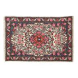 Oriental hand-knotted carpet with floral motif 170x103 cm